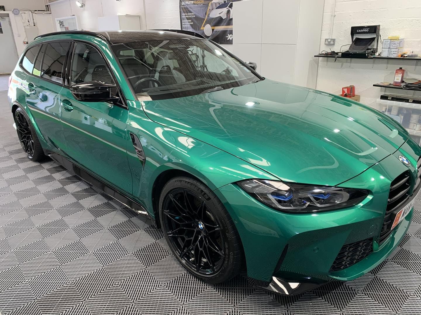 Teal BMW M4 after a detail