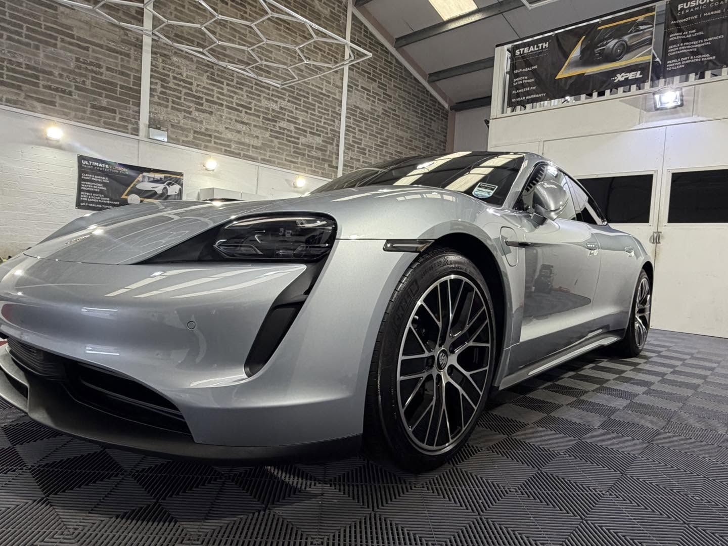 Silver Porsche Taycan after a detail