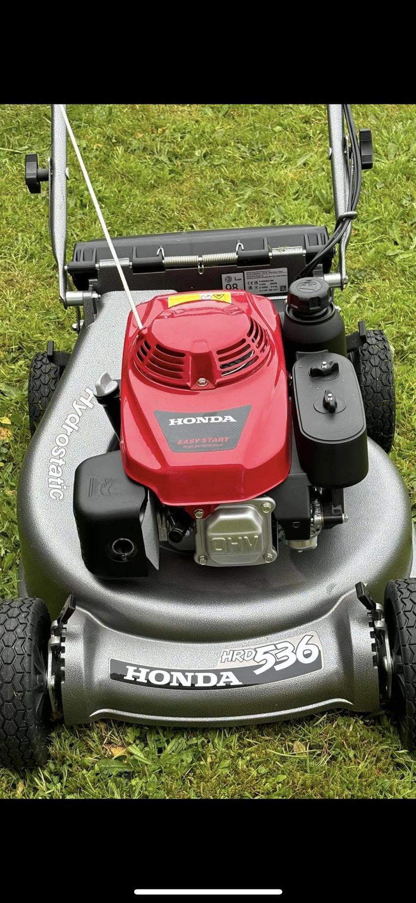 Honda mower on a freshly cut lawn