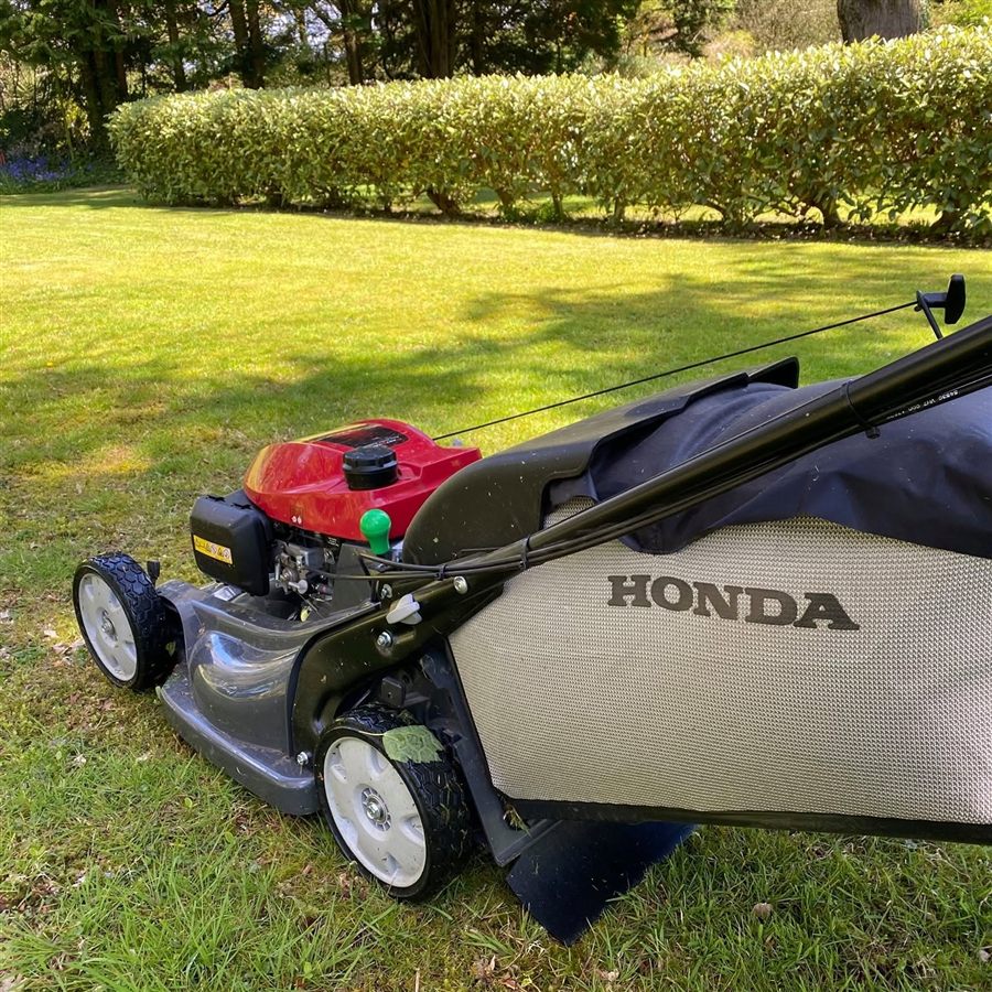 Honda mower on a freshly cut lawn