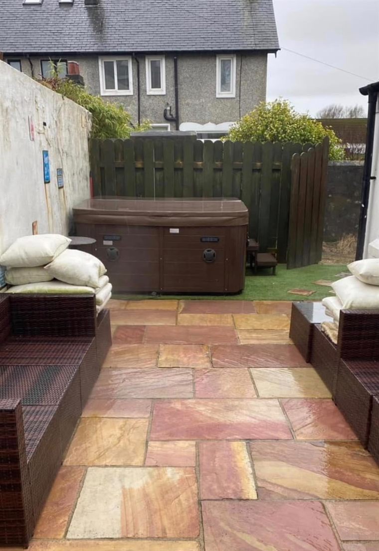 Sandstone patio after jet washing