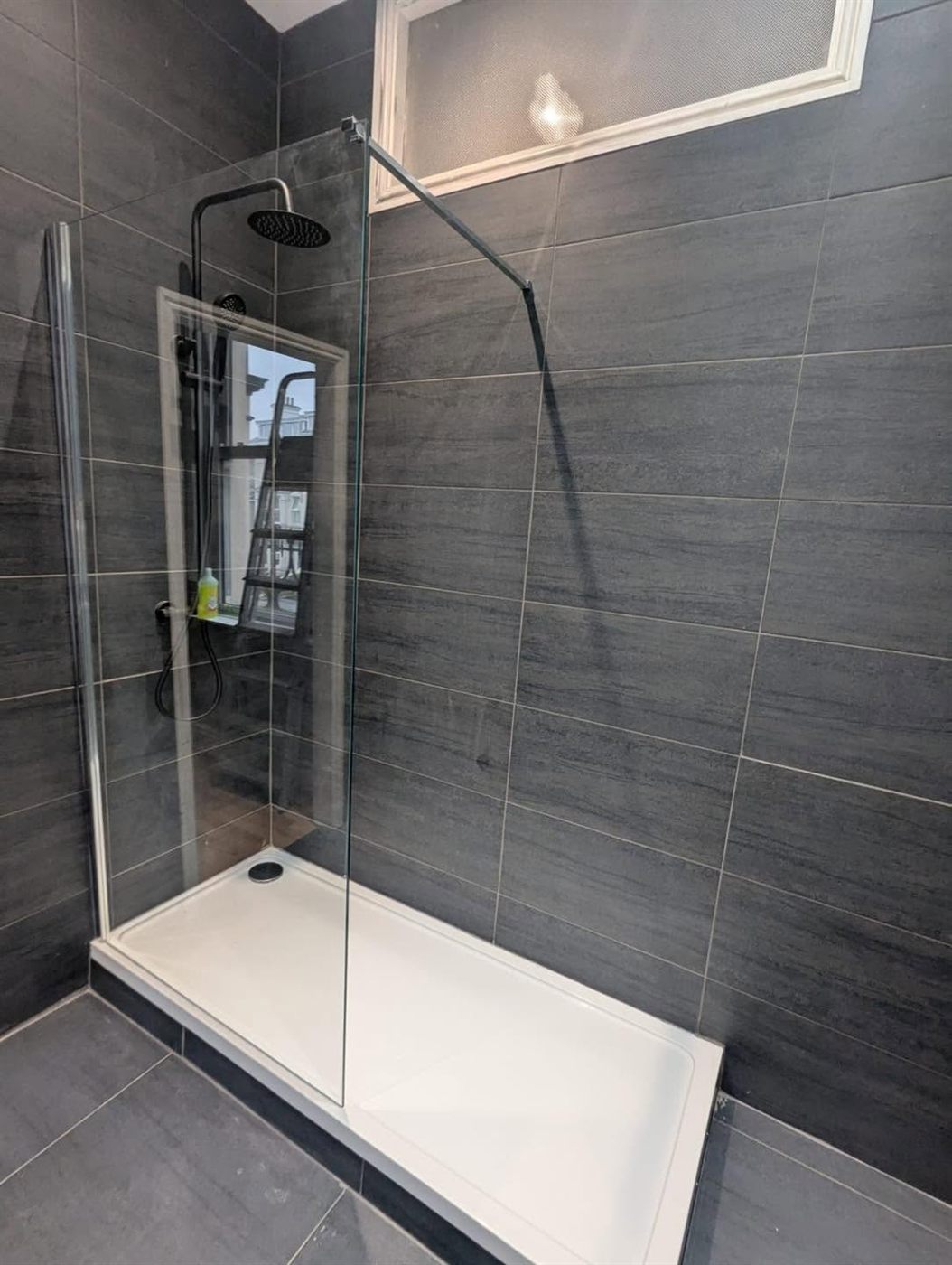 Walk-in shower with glass screen fitted by OTD