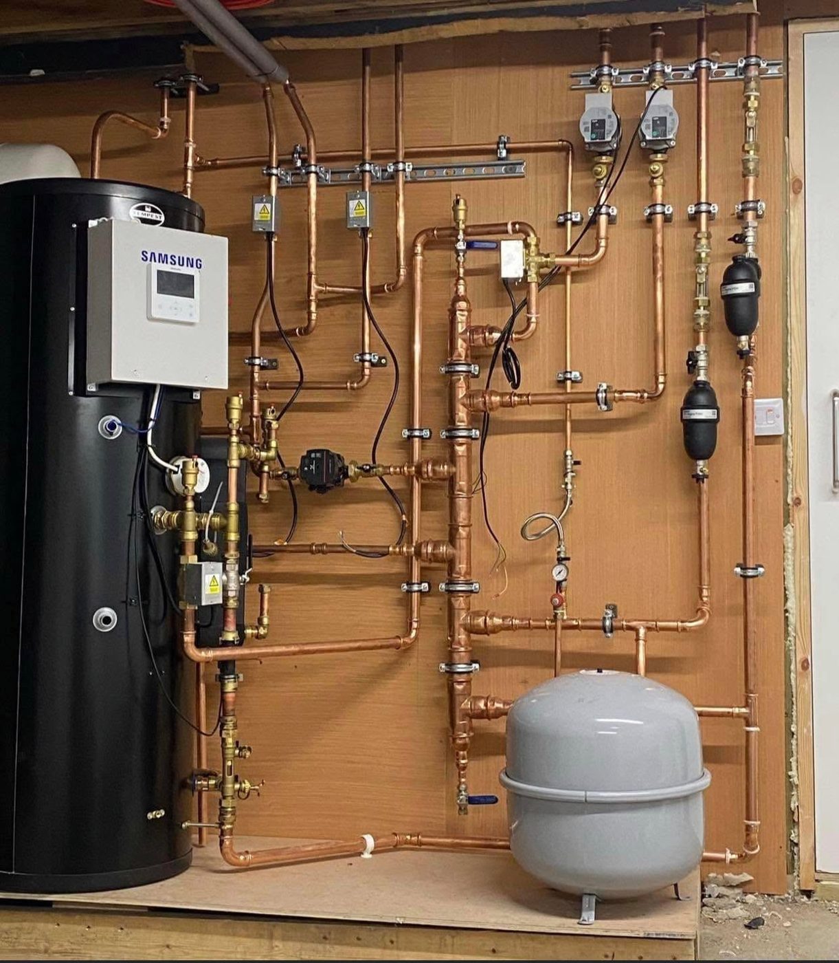 Full heating system with copper manifold and unvented cylinder