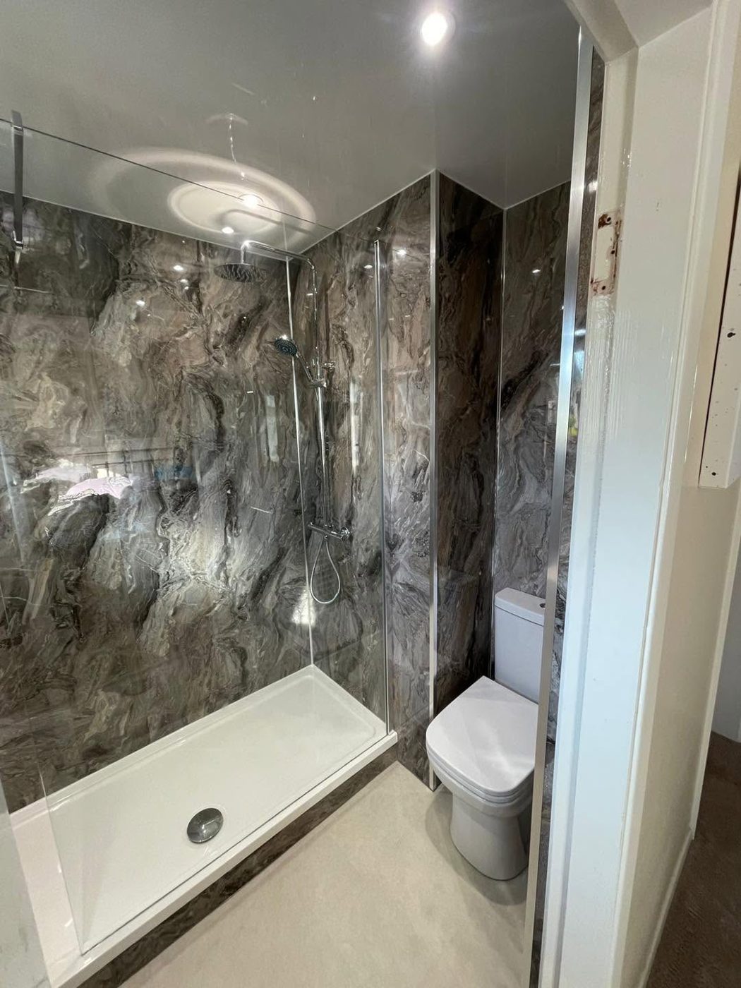 Grey marble walk-in shower with WC
